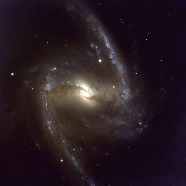 Figure 1: The Great Barred Galaxy NGC1365 as observed by the Very Large Telescope at the European Southern Observatory. This is a nice example of a SBb galaxy, a barred spiral with few although well developed spiral arms. | Credit: ESO.