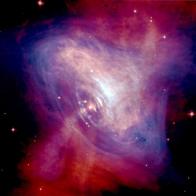 Figure 2. The gem of the treasure is shown in this composite image of the X-ray source inside the Crab Nebula. | Credit: X-ray – NASA/CXC/ASU/J. Hester et al.; optical – NASA/HST/ASU/J. Hester et al.