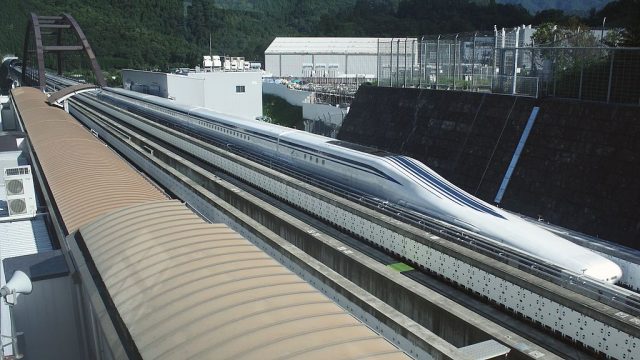 The SCMaglev (superconducting maglev) (formerly called the MLU) is a magnetic levitation (maglev) railway system. On 21 April 2015, a manned seven-car L0 series SCMaglev train reached a speed of 603 km/h (375 mph) | Credit: Wikimedia Commons / Saruno Hirobano