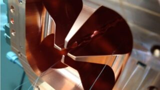 New Radio-Frequency Quadrupole design with symmetric direct transversal fields for efficient compact particle accelerators